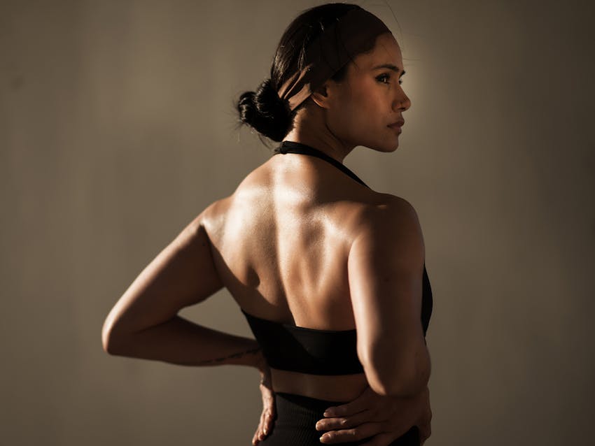 Woman looking over her shoulder