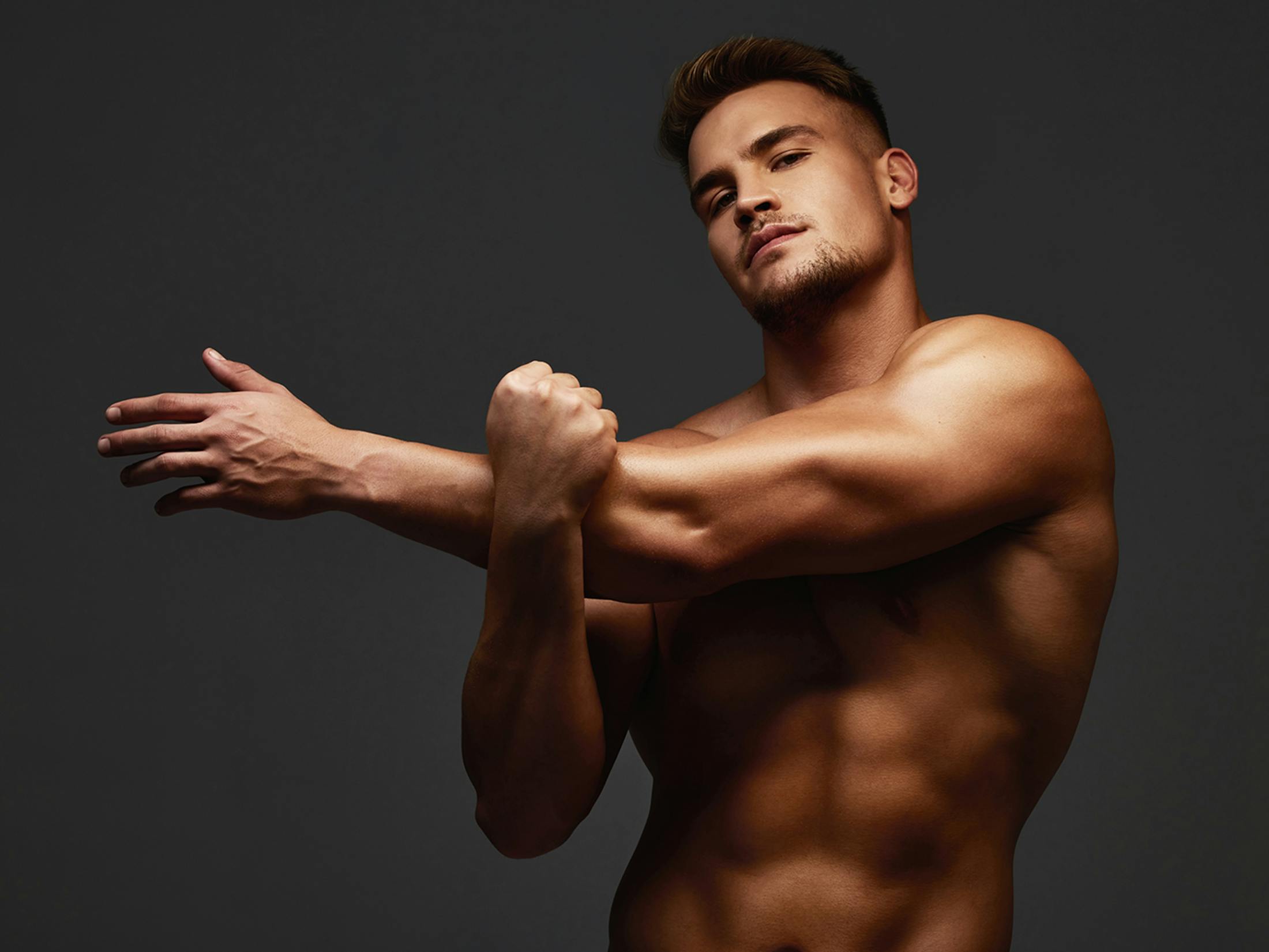Man stretching his arms