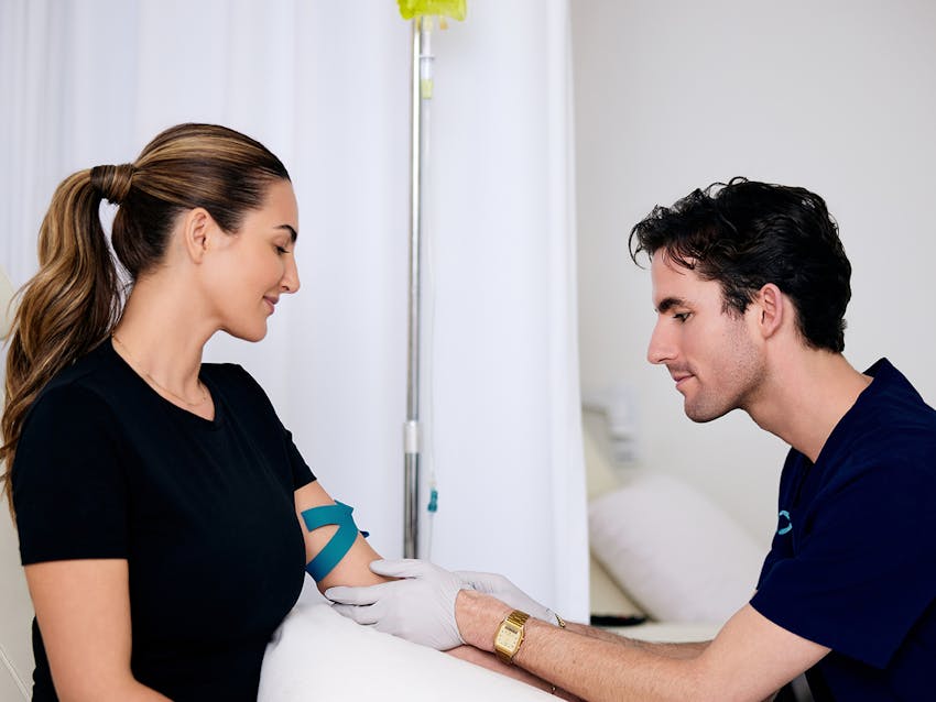 doctor helping a patient