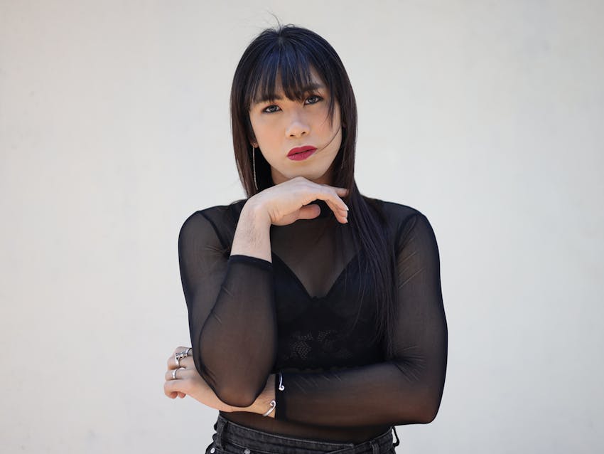 Person touching their chin