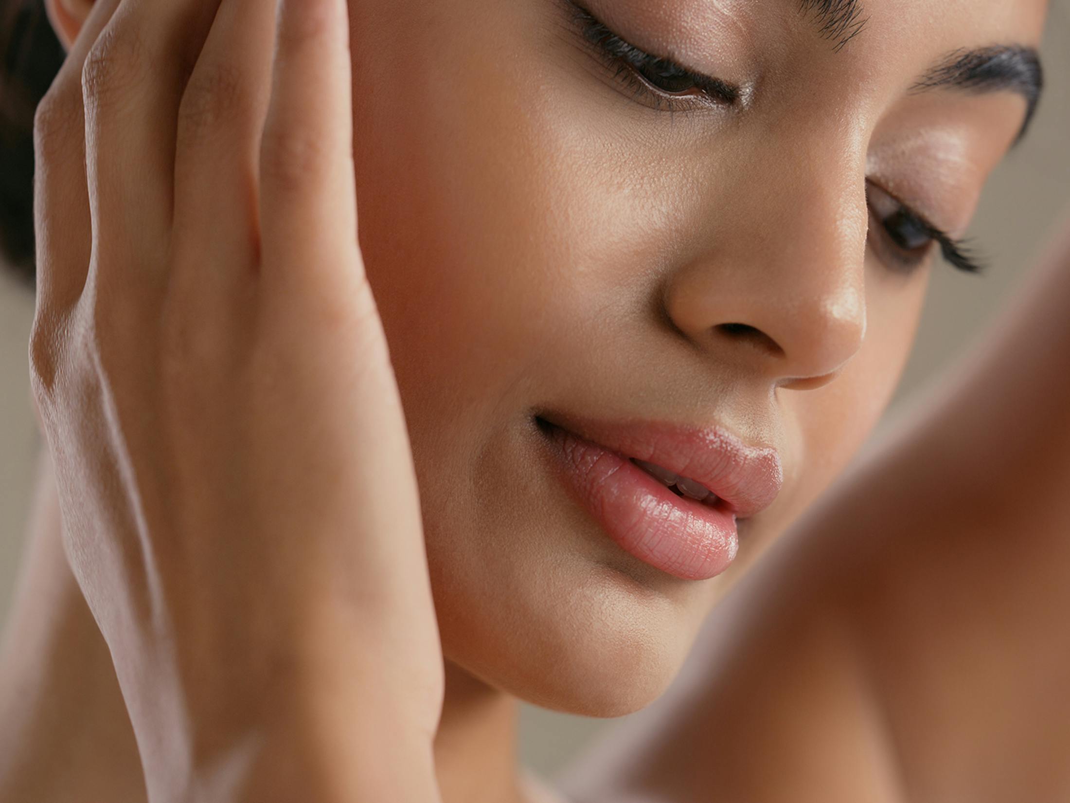 Woman touching her face