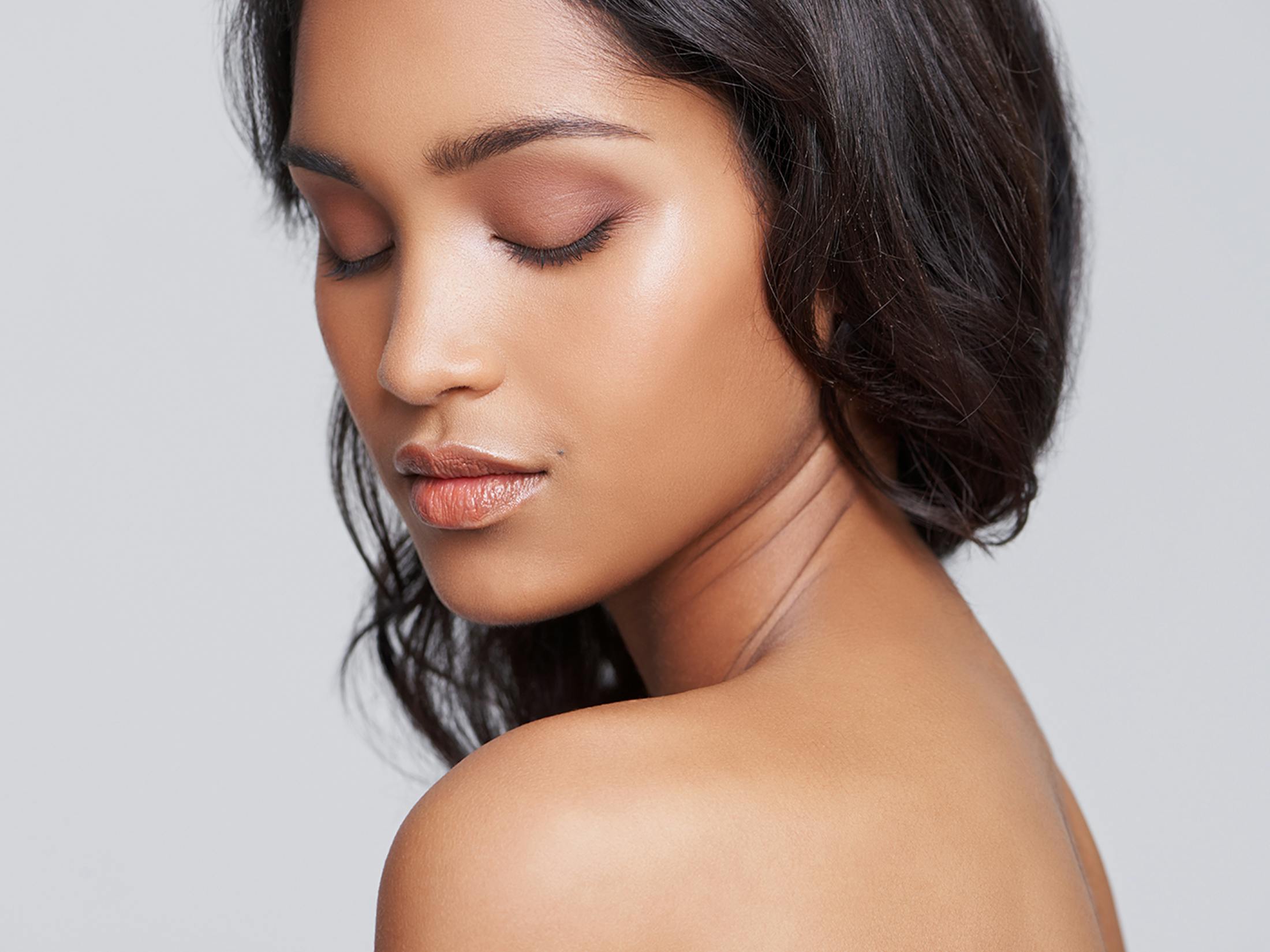 Woman with her eyes closed