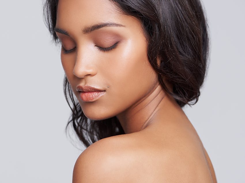 Woman with her eyes closed