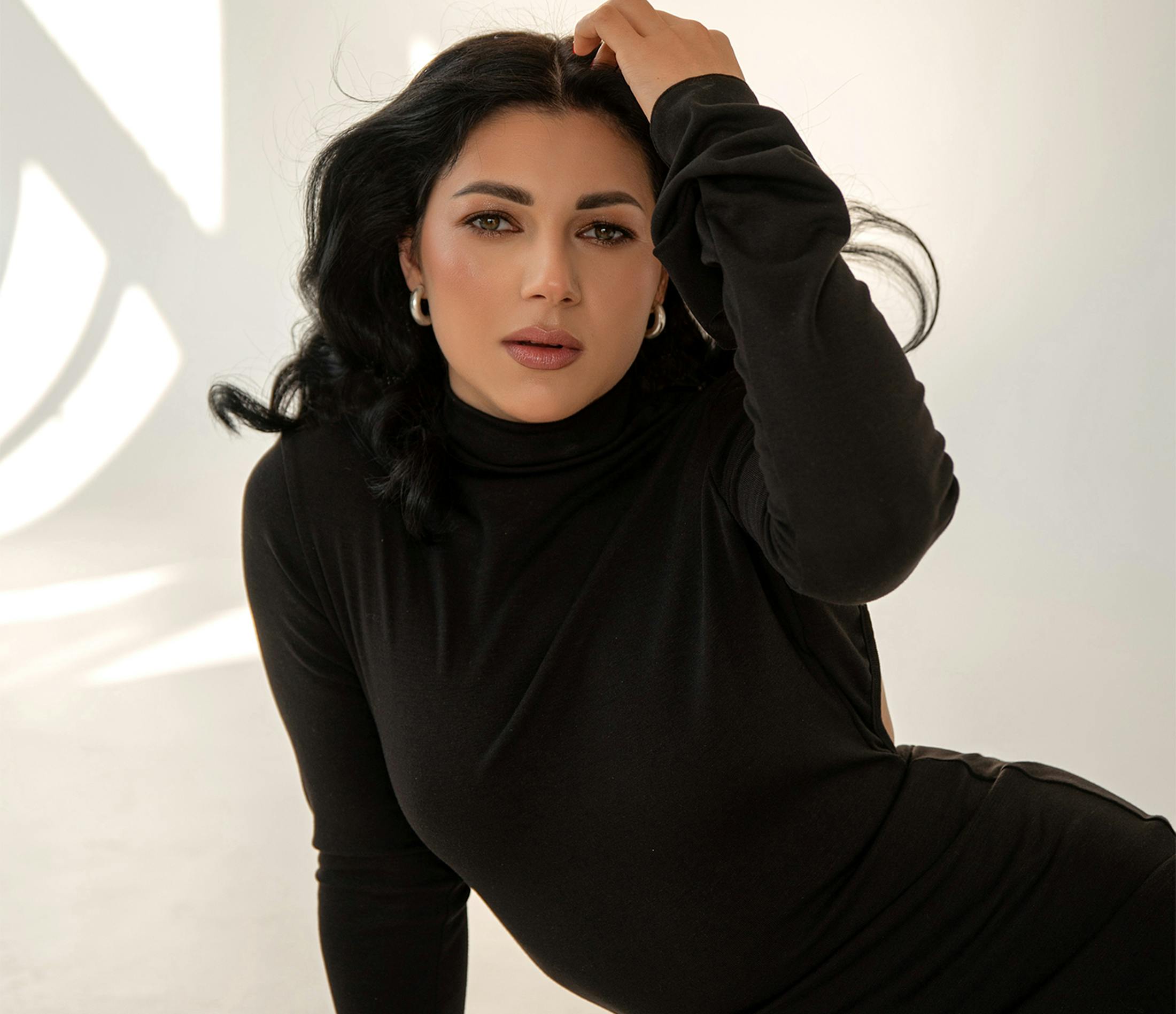 Woman touching her hair