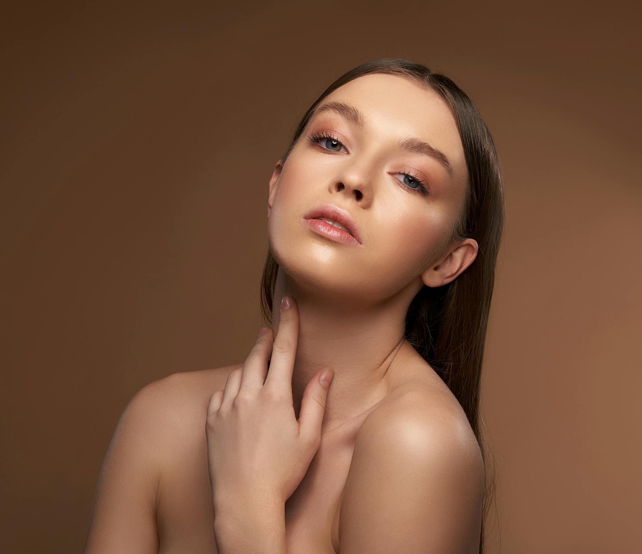 Woman touching her neck