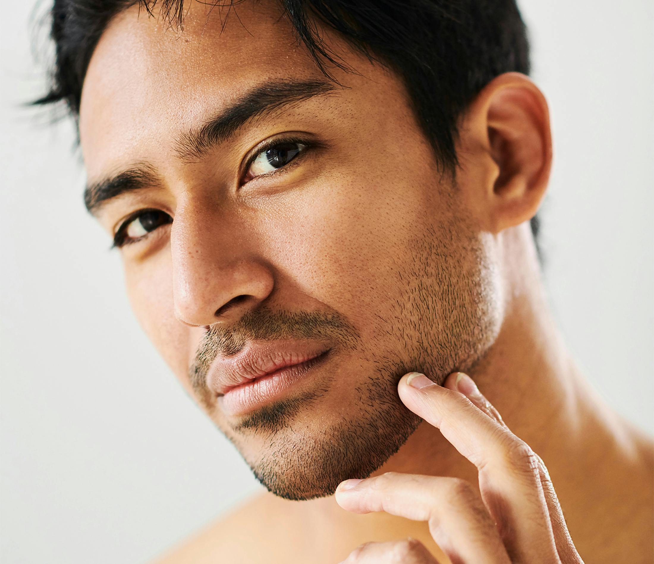 Man touching his jaw