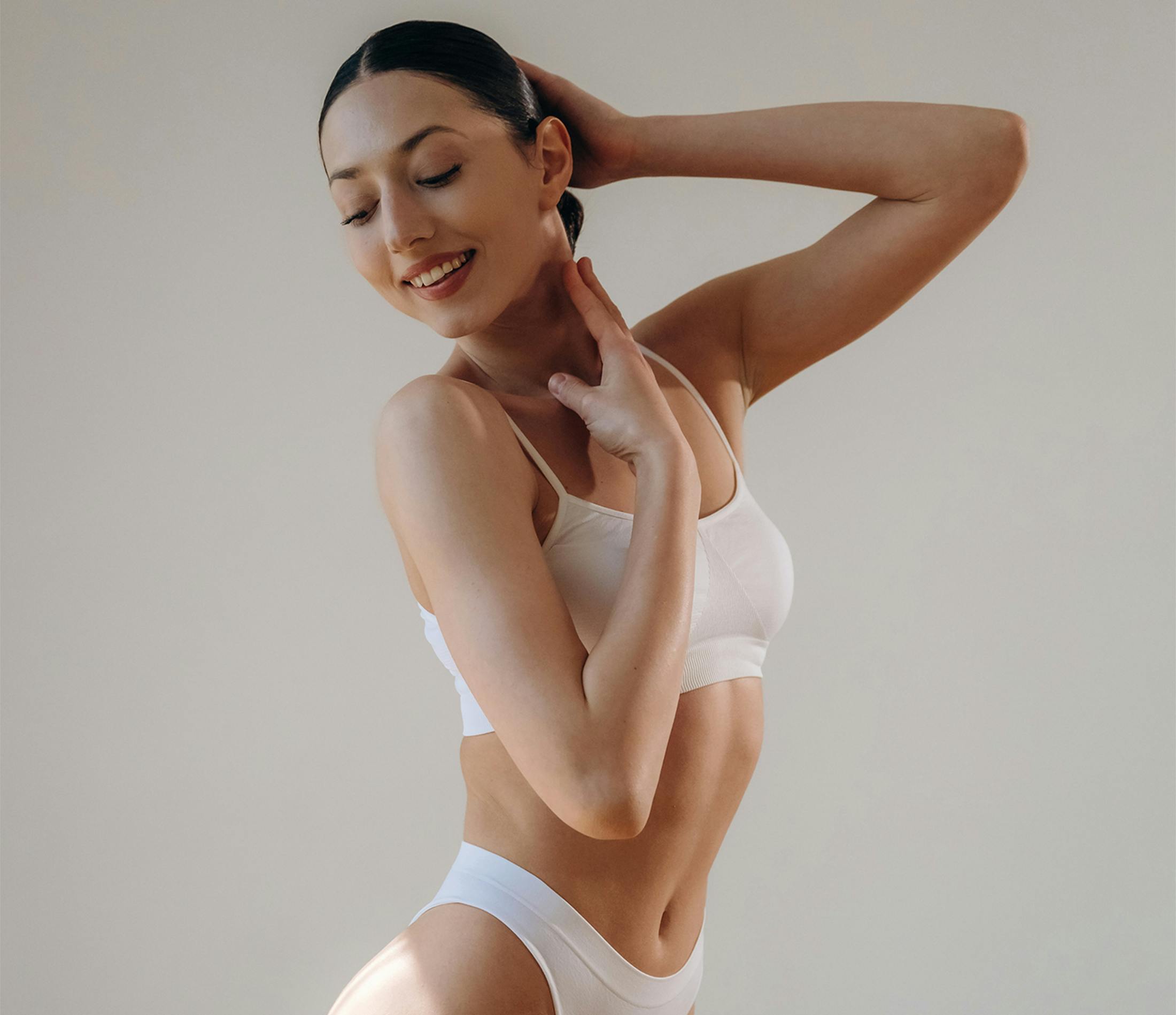 Woman touching her hair and neck