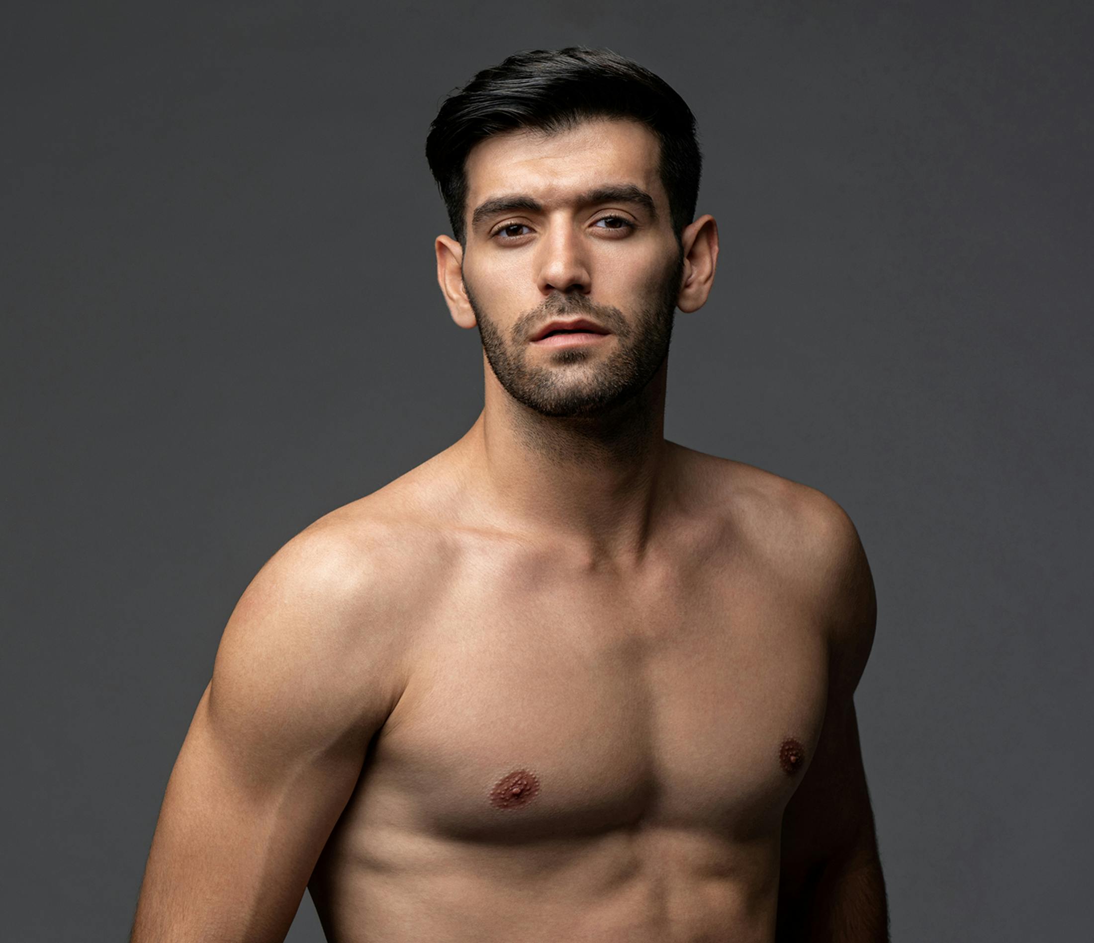 Man looking at his shoulder