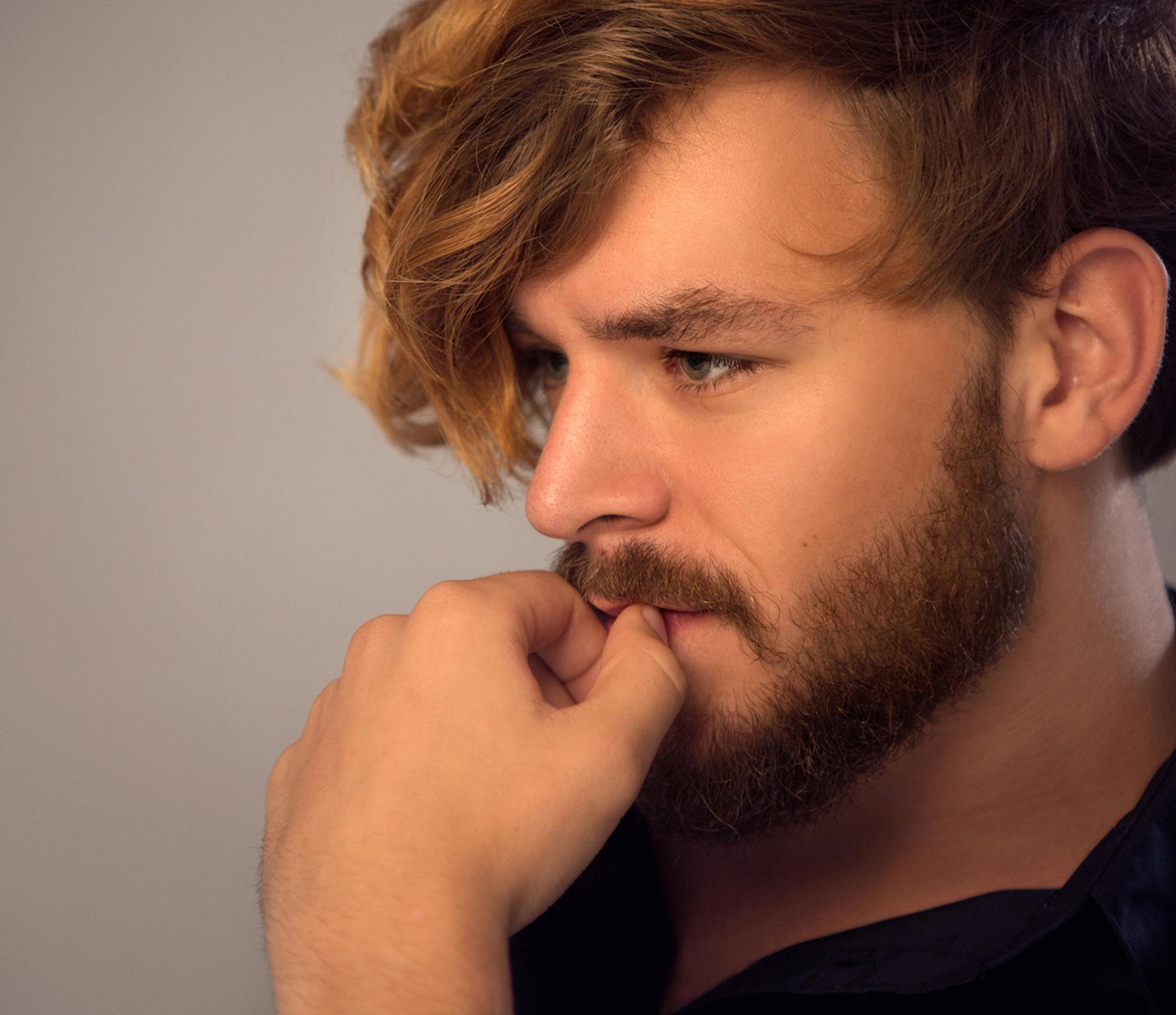 Man touching his chin