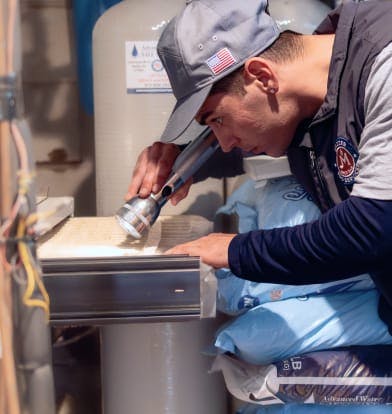 plumber with flashlight