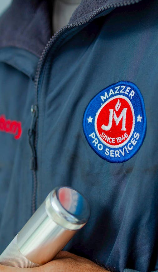 Mazzer Pro Services logo on jacket