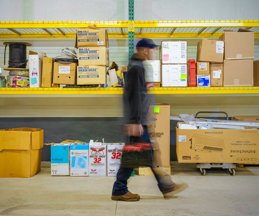 employee walking at the warehouse