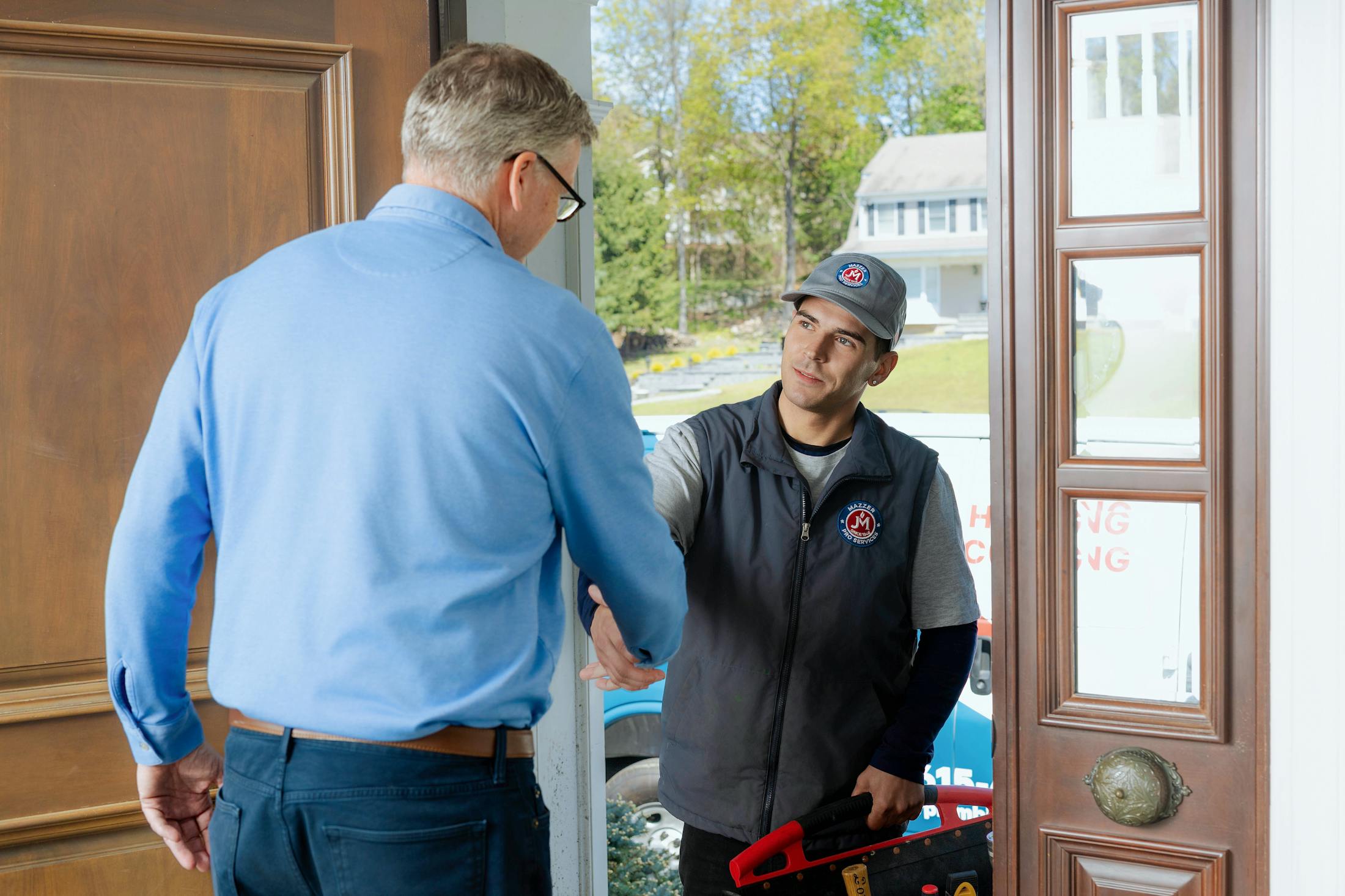 employee and client shaking hands