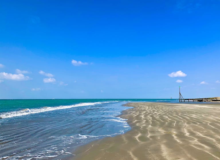 Oval Beach at Low Tide, courtesy of Coastal JJ Oval Beach Sands stretching all the way to Selsey's Marine Beach