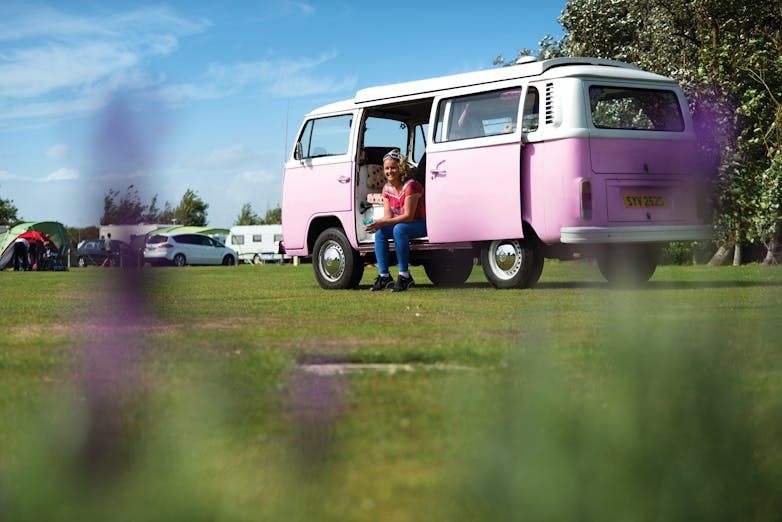Warner Farm camper van Image of a camper van in a field on a Warner Farm holiday