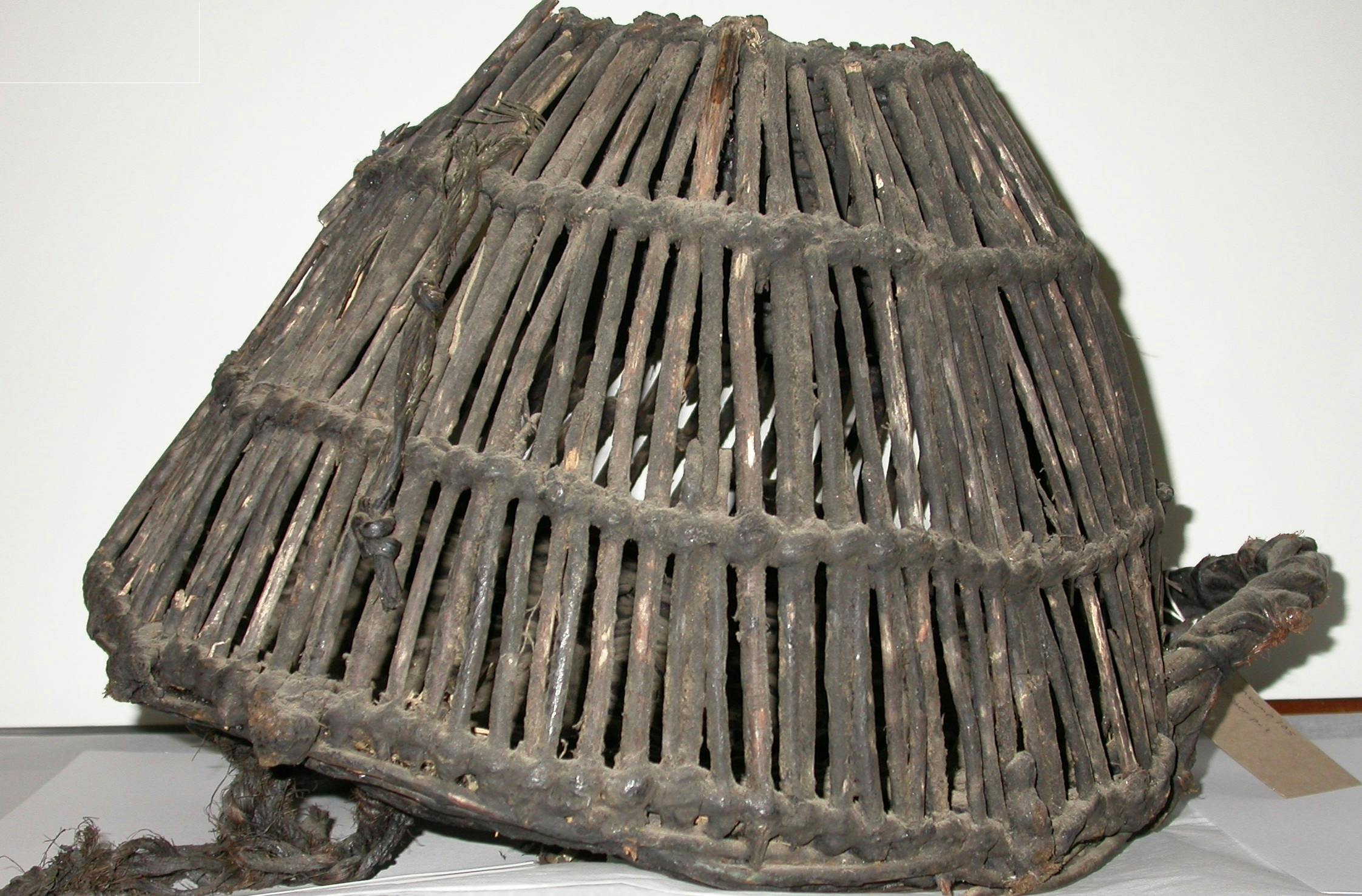 Image of a handmade prawn pot kept in the Novium Museum, Chichester 
