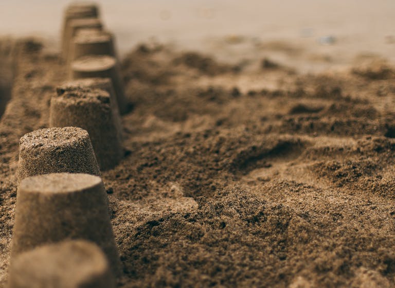 Sandcastle, courtesy of Daiga Ellaby Sandcastles leading down to the sea
