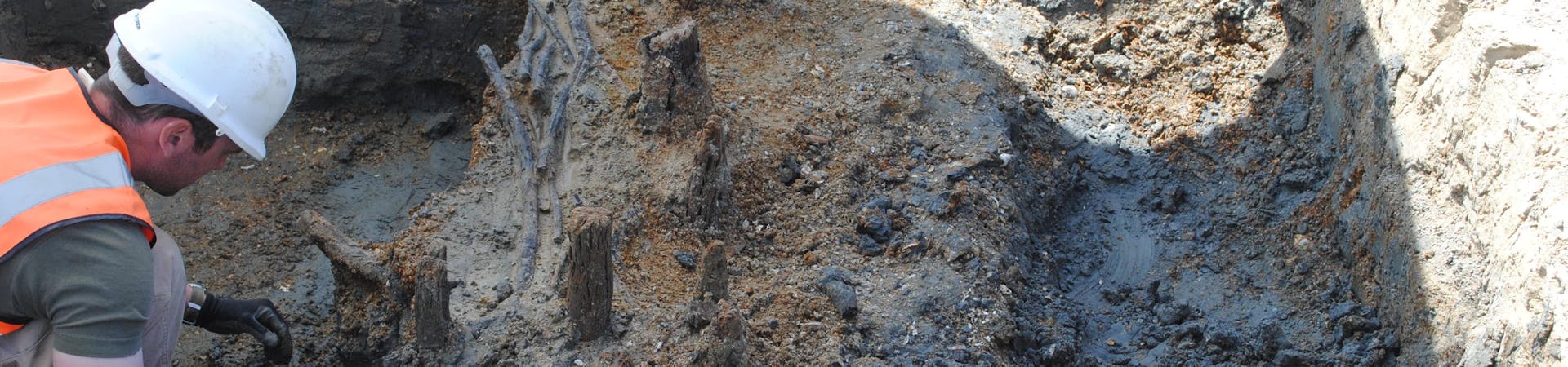 Archaeologist investigating medieval fish traps at Medmerry