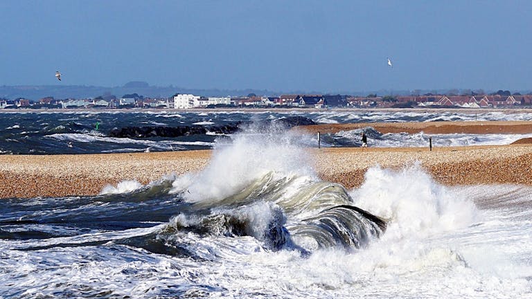 Rolling Waves Against the Shore, courtesy of CoastalJJ Rolling Waves against the shore with white horses of spray