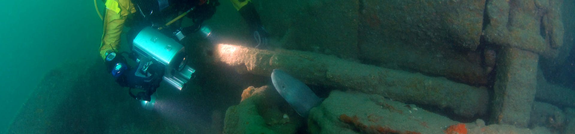 diver investigating the wreck of the bulldozer