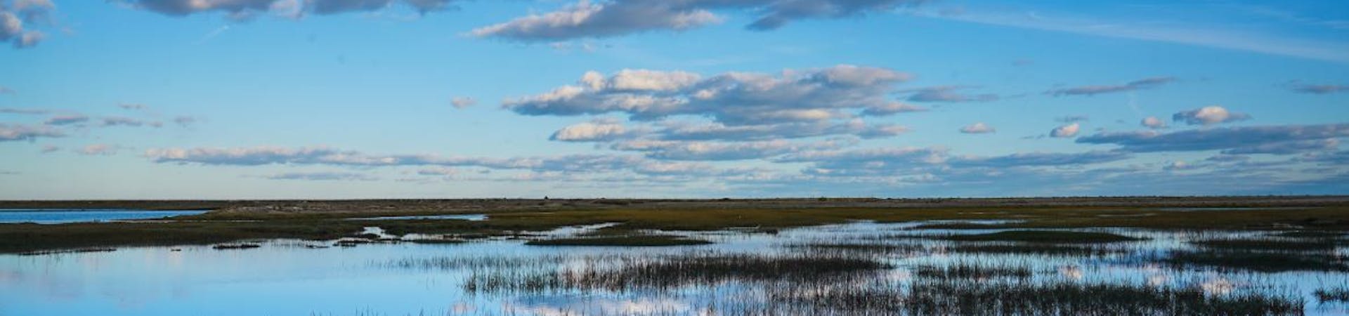 The clouds above being reflected in the water below