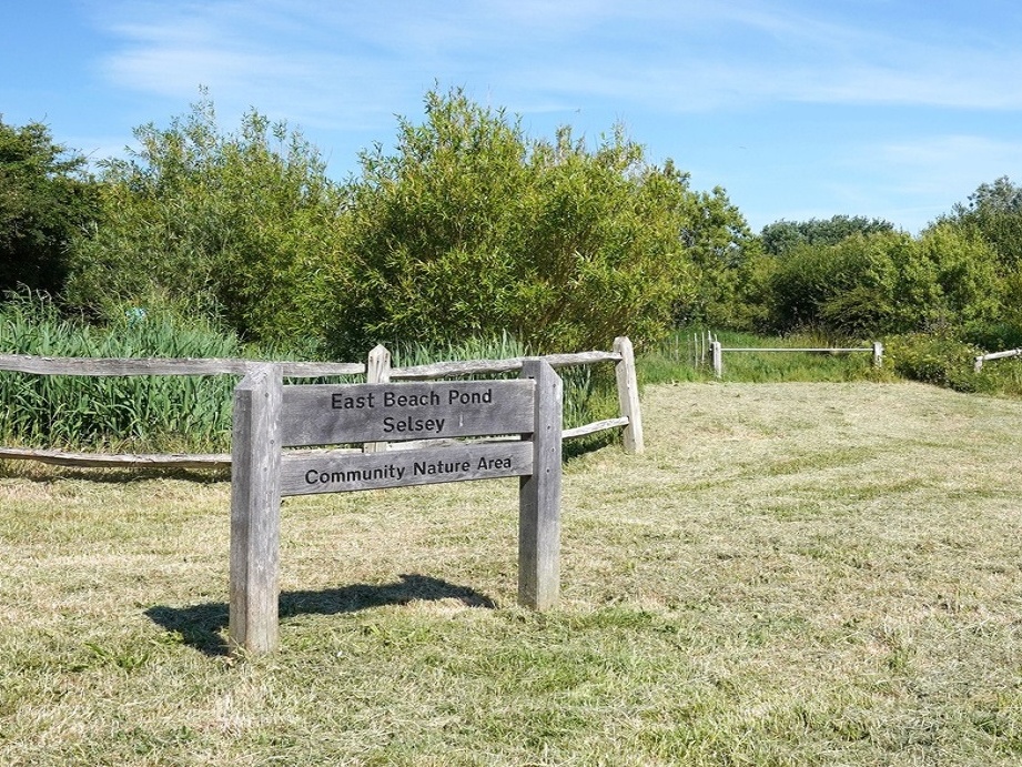 Signage at the entrance to East Beach Pond, Selsey 