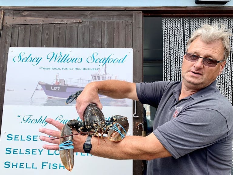 Richard Langford, Selsey Willows Seafood Richard holding a freshly caught live lobster