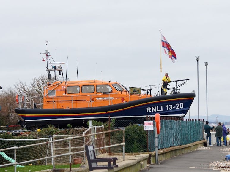 RNLI Selsey Lifeboat, courtesy of CoastalJJ Lifeboat at Selsey infront of the Lifeboat station at Selsey