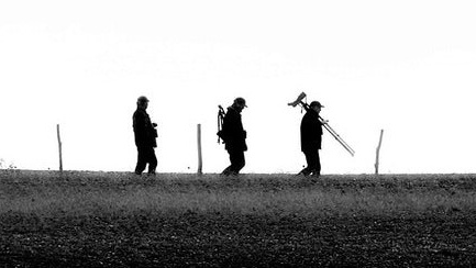 Three birders with their equipment at Pagham Harbour 