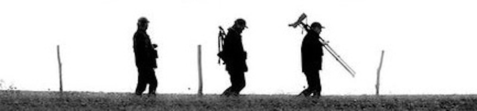 Three birders with their equipment at Pagham Harbour
