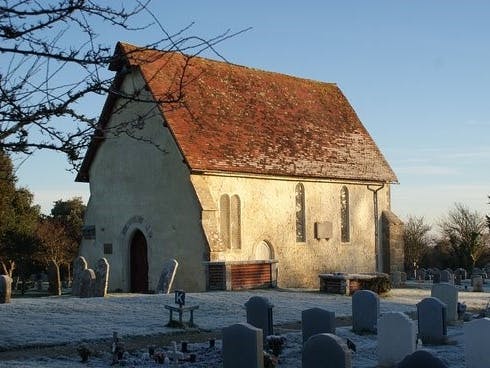 Image of the chapel of St Wilfrids in winter with snow on the ground