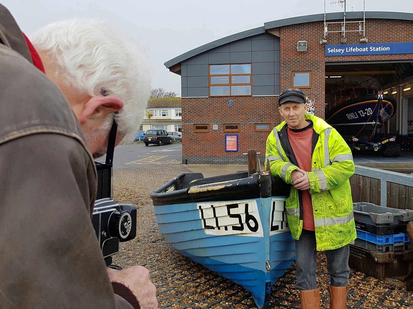 Gem, local fisherman being photographed during the Sea's the Day project outside the Selsey Lifeboat Station 