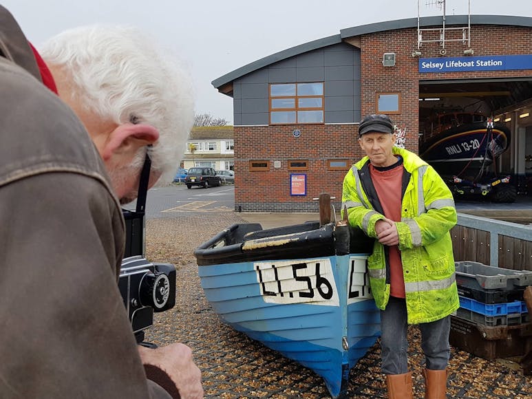 Gem Lawrence, local fisherman with his Fishing boat, courtesy of Sea's the Day Gem, local fisherman being photographed during the Sea's the Day project outside the Selsey Lifeboat Station