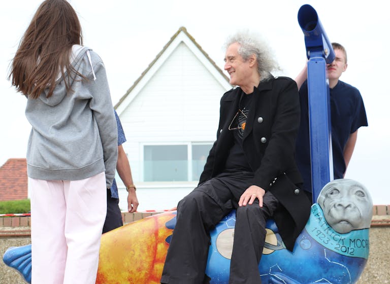 Dr Brian May sat on Sir Patrick Moore and Selsey's Dark Skies Seal Dr Brian May sat on Sir Patrick Moore and Selsey's Dark Skies Seal