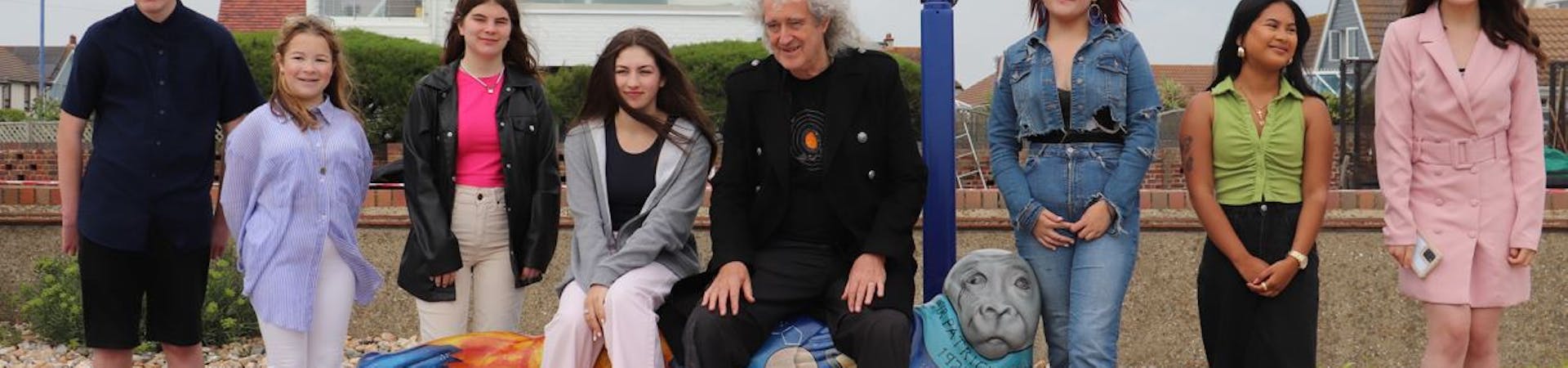 Seven Selay Seal Art Trail designers pictured alonside Dr. Brian May who unveiled the Dark Skies Seal.