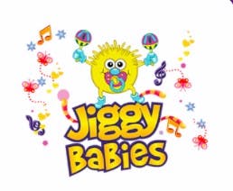 Jiggy Babies by Jiggy Wrigglers Jiggy Babies logo with cartoon baby, rattle and music signs