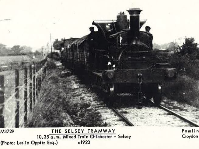 Black and white image showing a a mixed train