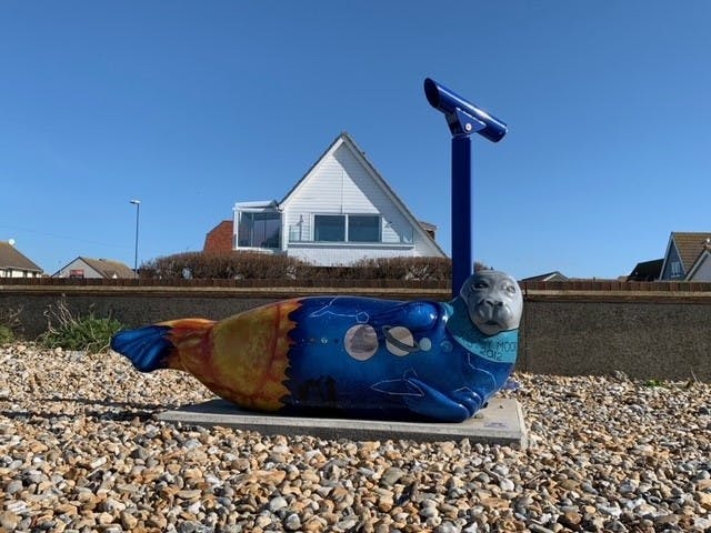 Art Trail Seal at Marine Car Park, designed by Megan Masters, celebrating Sir Patrick Moore and Selsey's Dark Skies