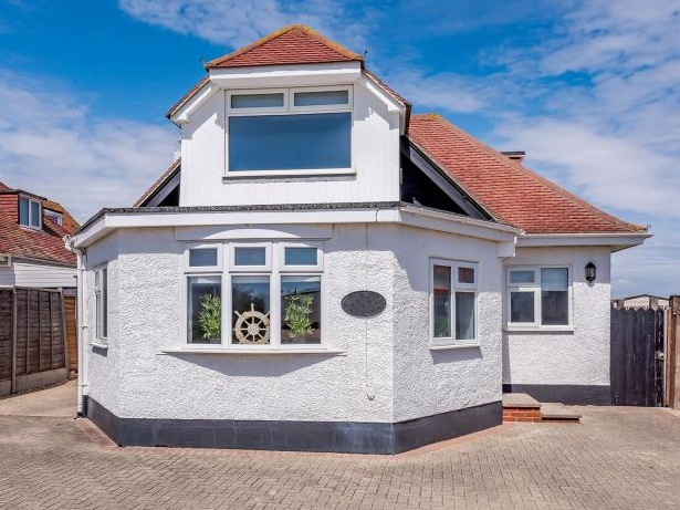 Photograph of the front of a two story detatched property