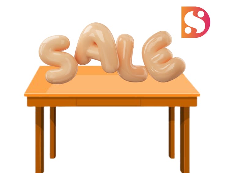 Table Top Sale Balloons shaped into the word sale on top of a table