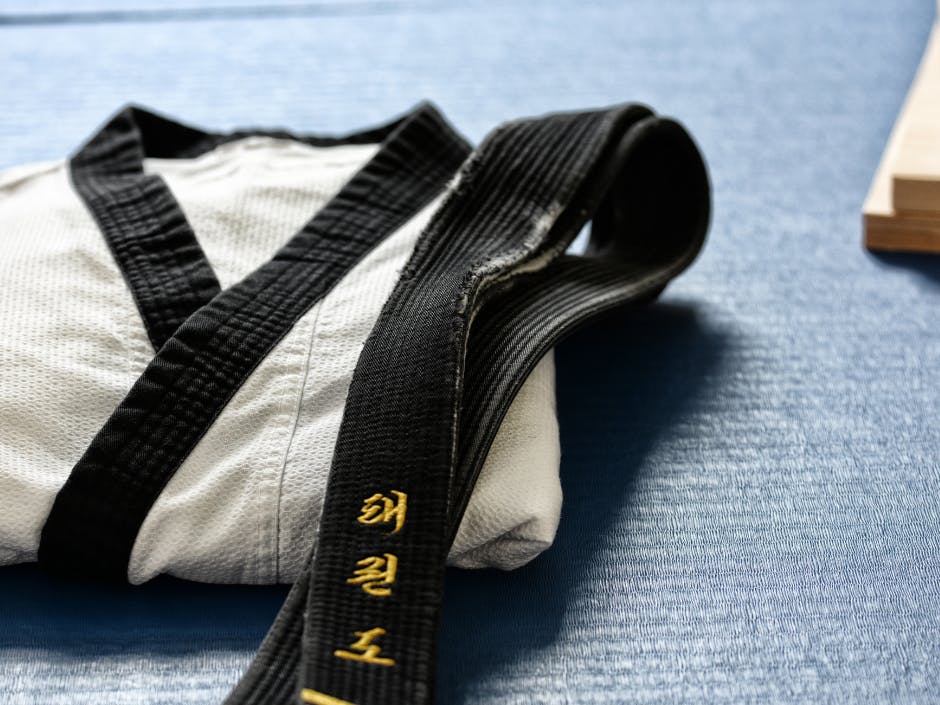 Taekwondo uniform, top and black belt