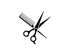 Black and white illustration of scissors and a comb