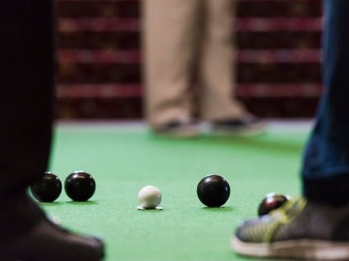 A photograph of carpet bowls.