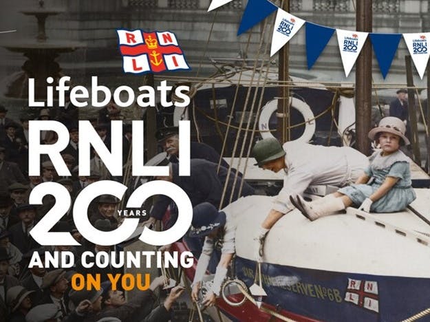Poster advertising 200 years of the RNLI Lifeboats with the image of a child sat on an old lifeboat looking directly at the camera, set around the 1920s