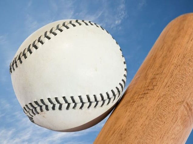 Anyone for Rounders? courtesy of Mark Goddard from Getty Images Signiture on canva.com Photograph of a bat with ball for a game of rounders