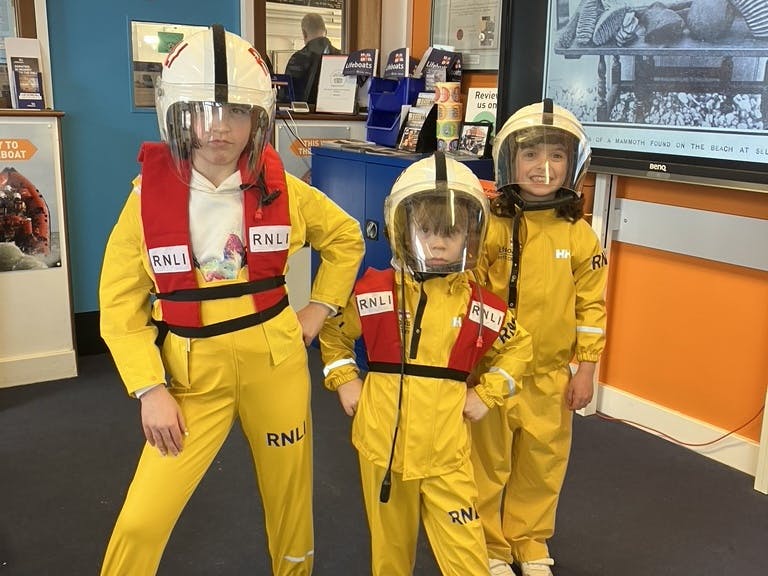 Photograph of Kids dressing up as Lifeboat Crew!