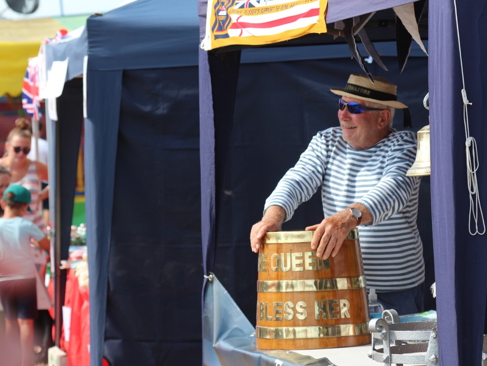 Photograph of a Stall Holder at Lifeboat Village courtesy of RNLI Selsey