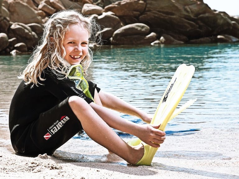 Kids Introduction to Snorkelling courtesy of Mulberry Marine Experiences Child getting ready to go snorkelling