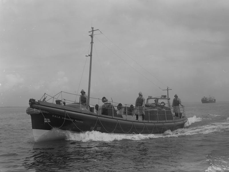RNLI Selsey Lifeboat Canadian Pacific during World War Two courtesy of RNLI Heritage photograph of the war time lifeboat crew at sea on Canadian Pacific