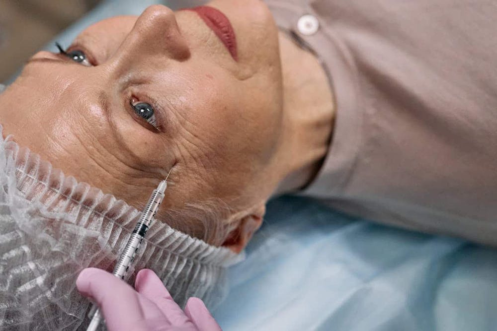 woman getting an injectable treatment